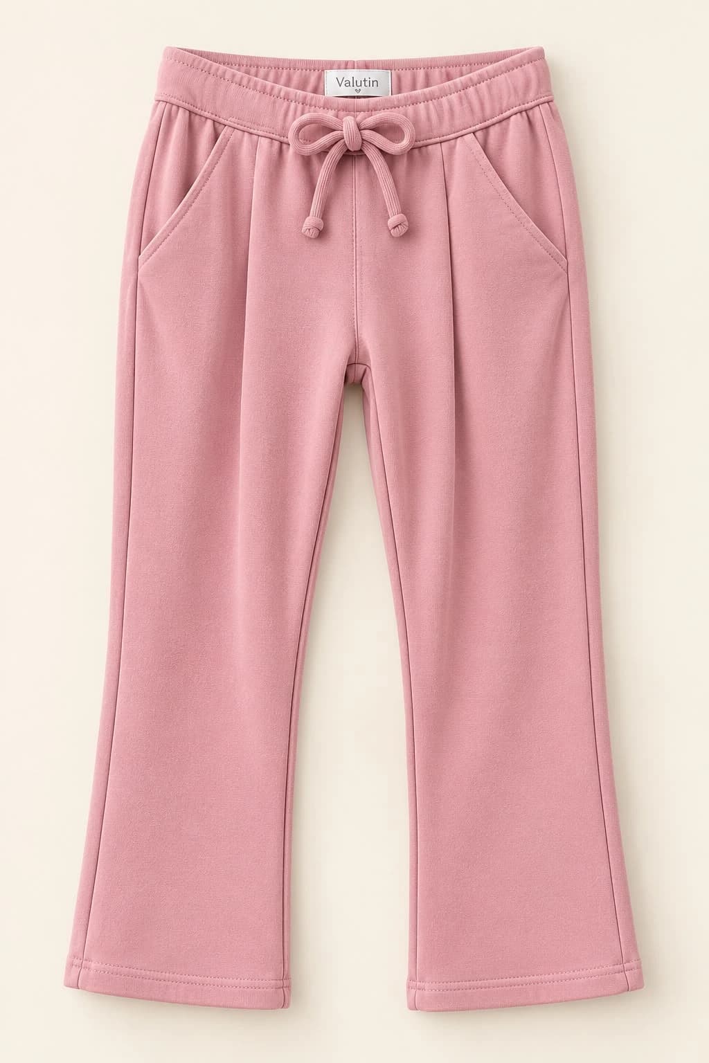 Calça Básica Feminina — Rosa — Calça básica feminina rosa com laço na cintura e bolsos laterais